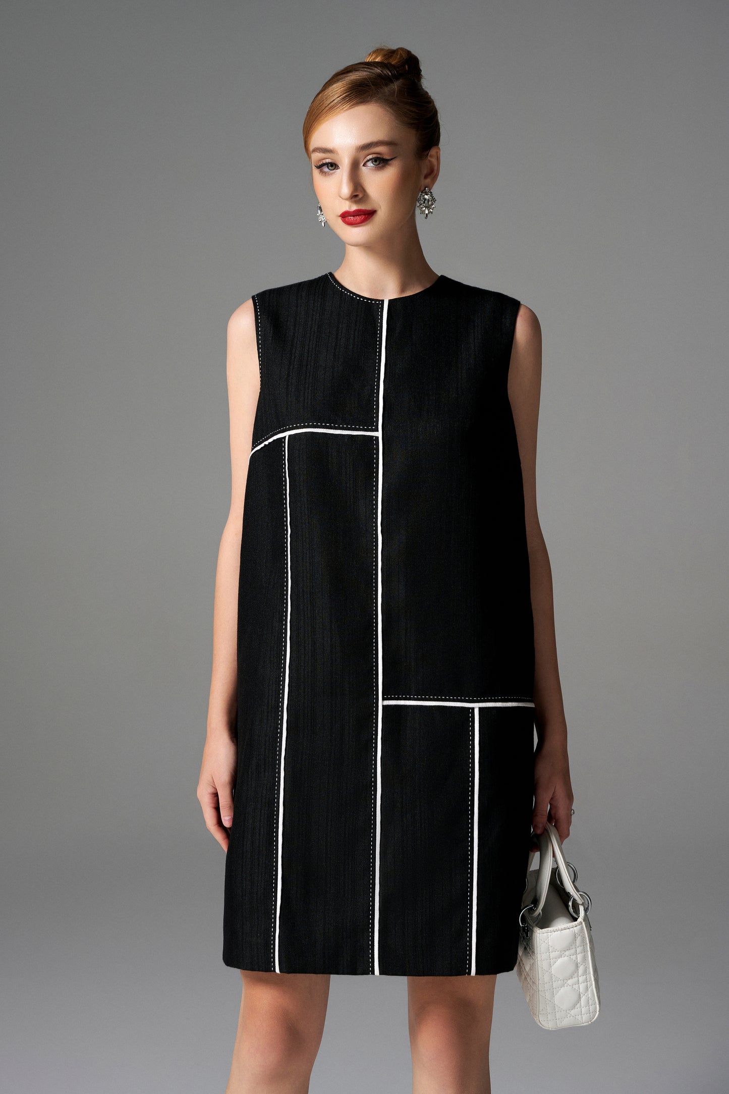 Sleeveless Black Shift Dress with Geometric White Stitch Detailing