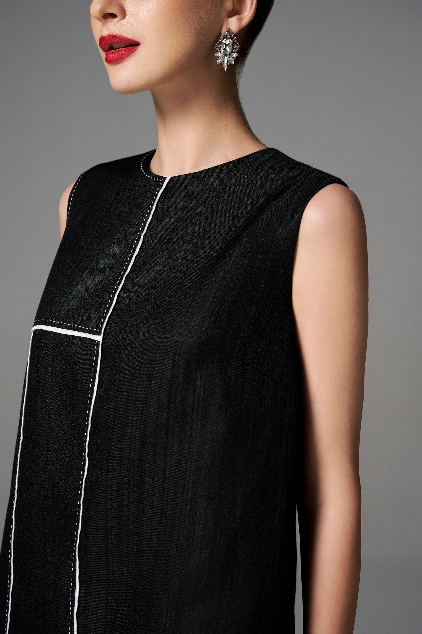 Sleeveless Black Shift Dress with Geometric White Stitch Detailing