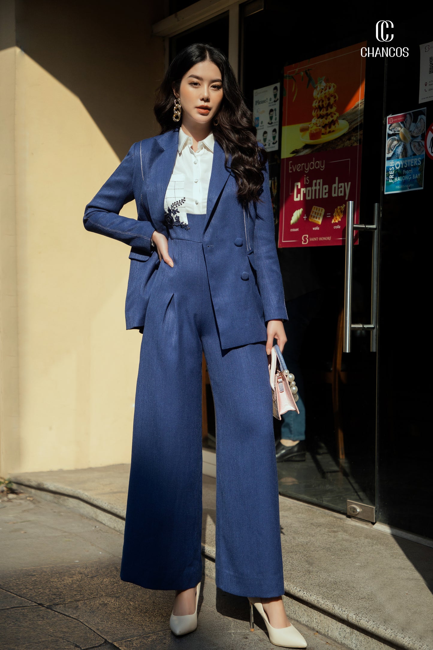 Double-Breasted Blue Blazer with White Stitch Detail