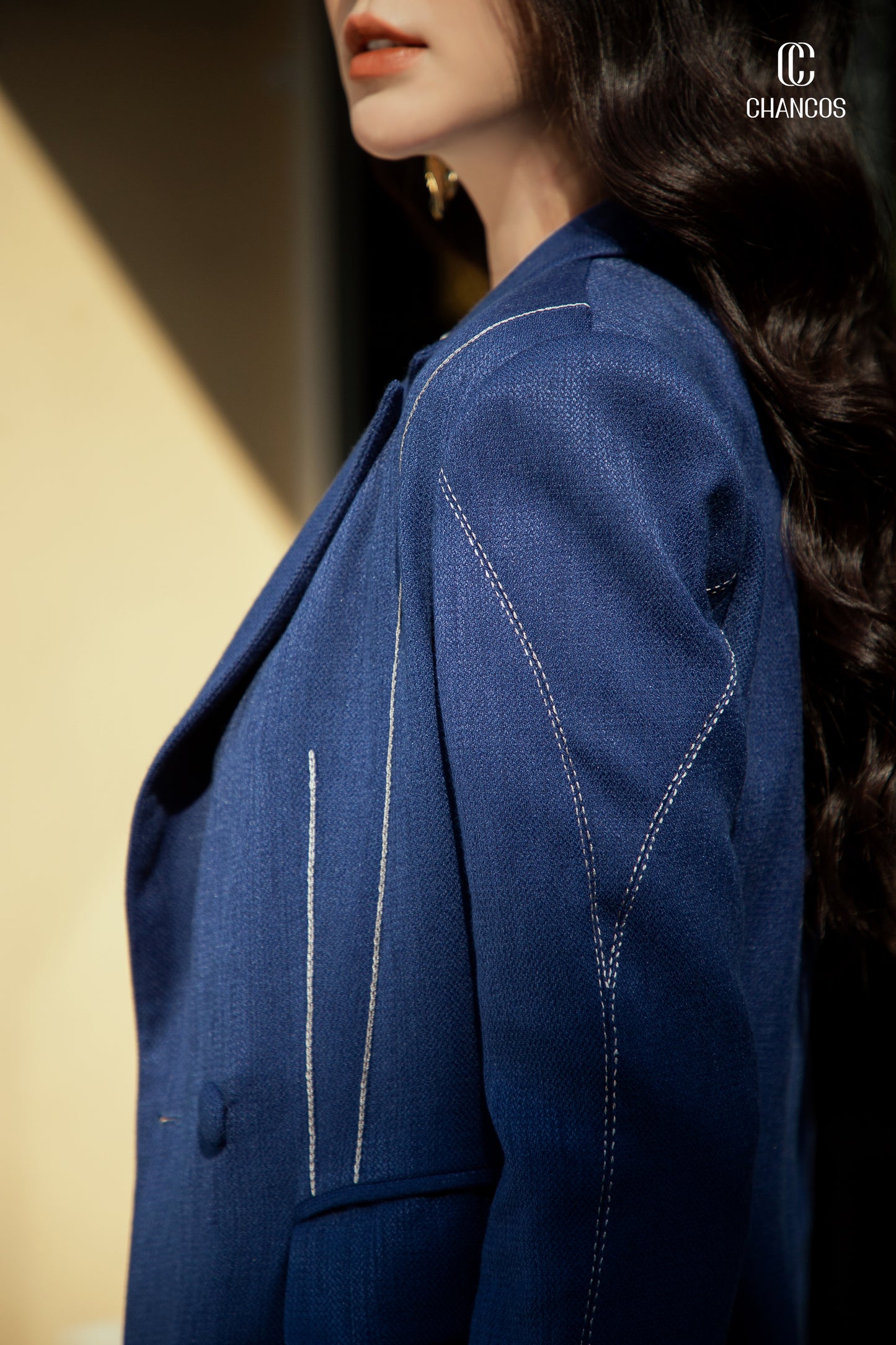 Double-Breasted Blue Blazer with White Stitch Detail
