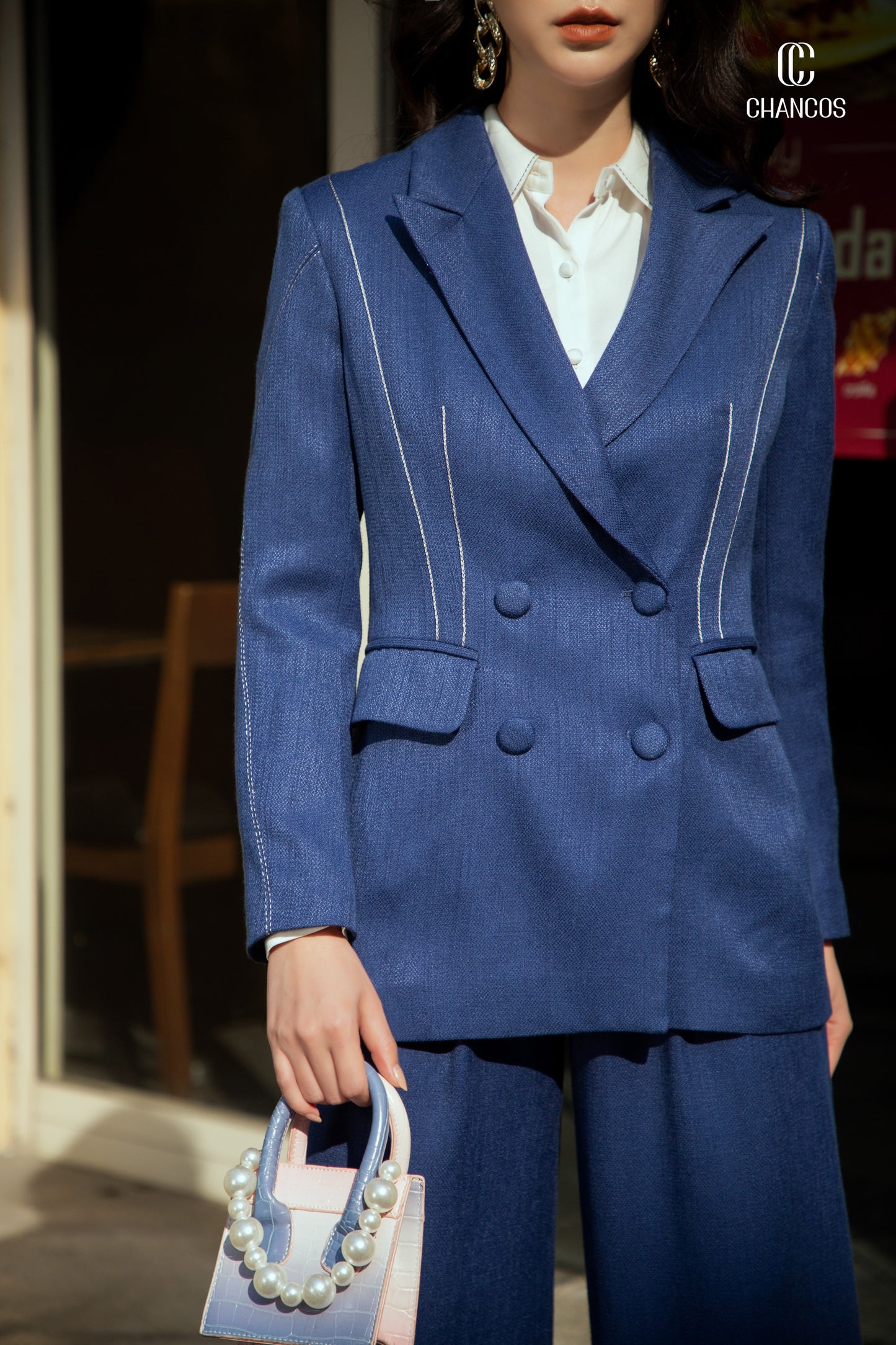 Double-Breasted Blue Blazer with White Stitch Detail