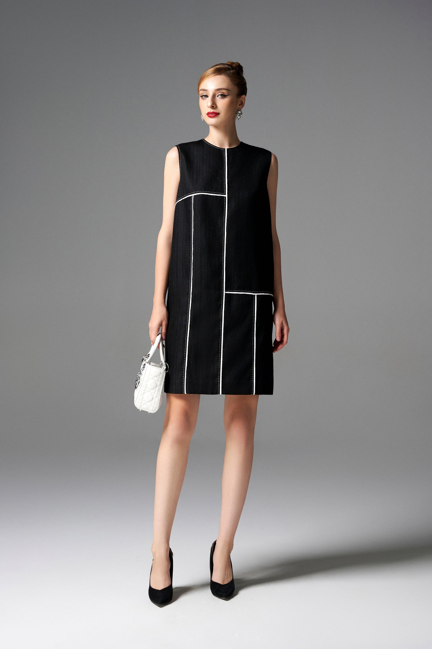 Sleeveless Black Shift Dress with Geometric White Stitch Detailing