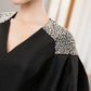 Black Peplum Midi Dress with Ruffled Sleeves and Pearl Detailing