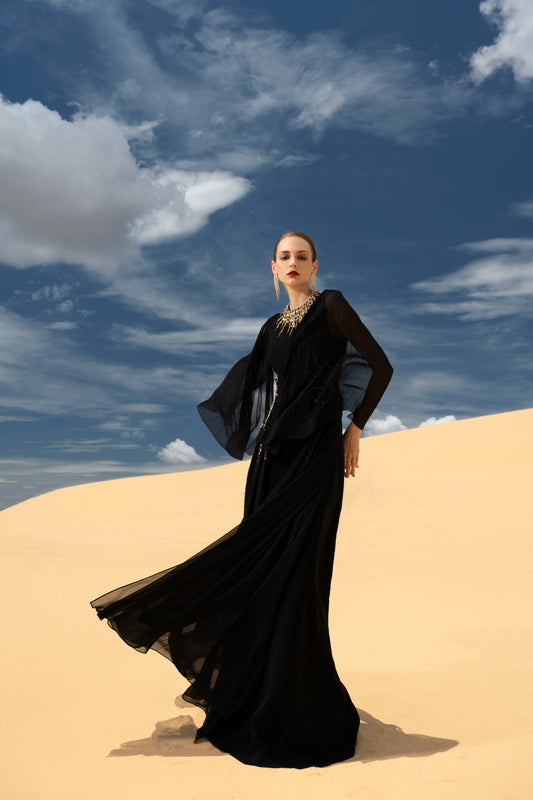 Black Flowing Chiffon Gown with Flared Sleeves and Gold Embellishments